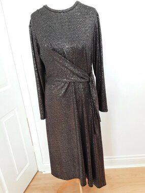 Ms. Zuck's evening dress, a London brand